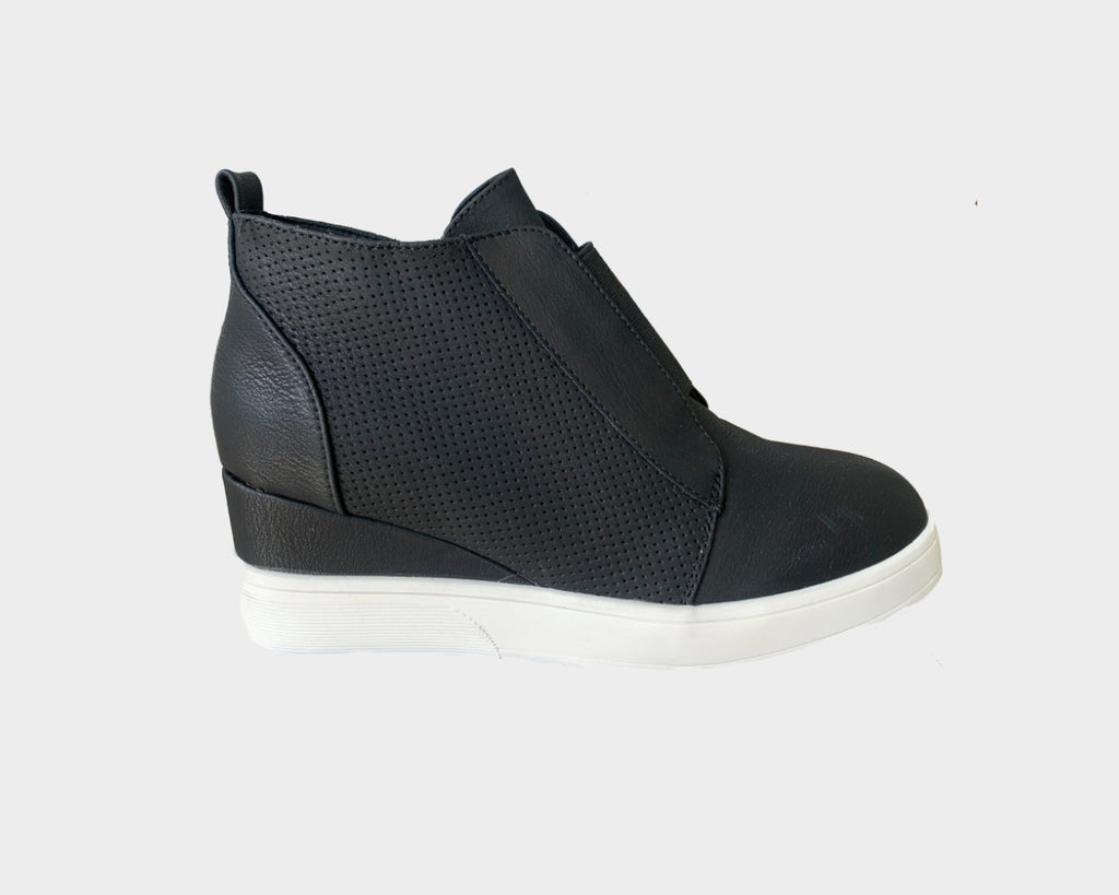 4. The Bond Black Wedge Sneakers - The Milano